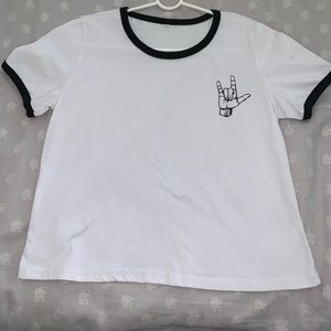 A white shirt with black accents